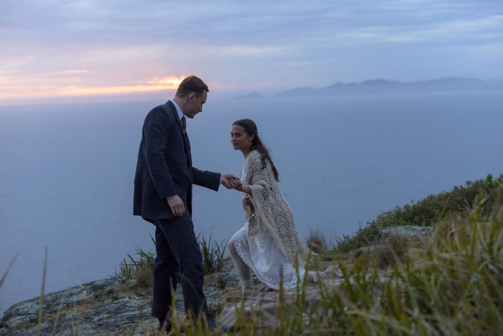 Michael Fassbender stars as Tom Sherbourne and Alicia Vikander as his wife Isabel in DreamWorks Pictures' poignant drama THE LIGHT BETWEEN OCEANS, written and directed by Derek Cianfrance based on the acclaimed novel by M.L. Stedman. Davi Russo ©DreamWorks II Distribution Co., LLC.  All Rights Reserved.